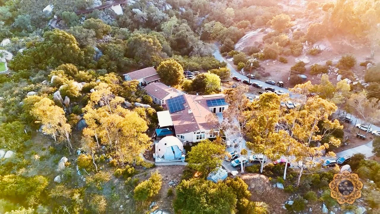 Aerial view of The ARC retreat campus at golden hour
